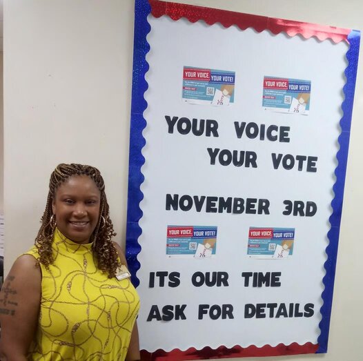 African American Female at Voting