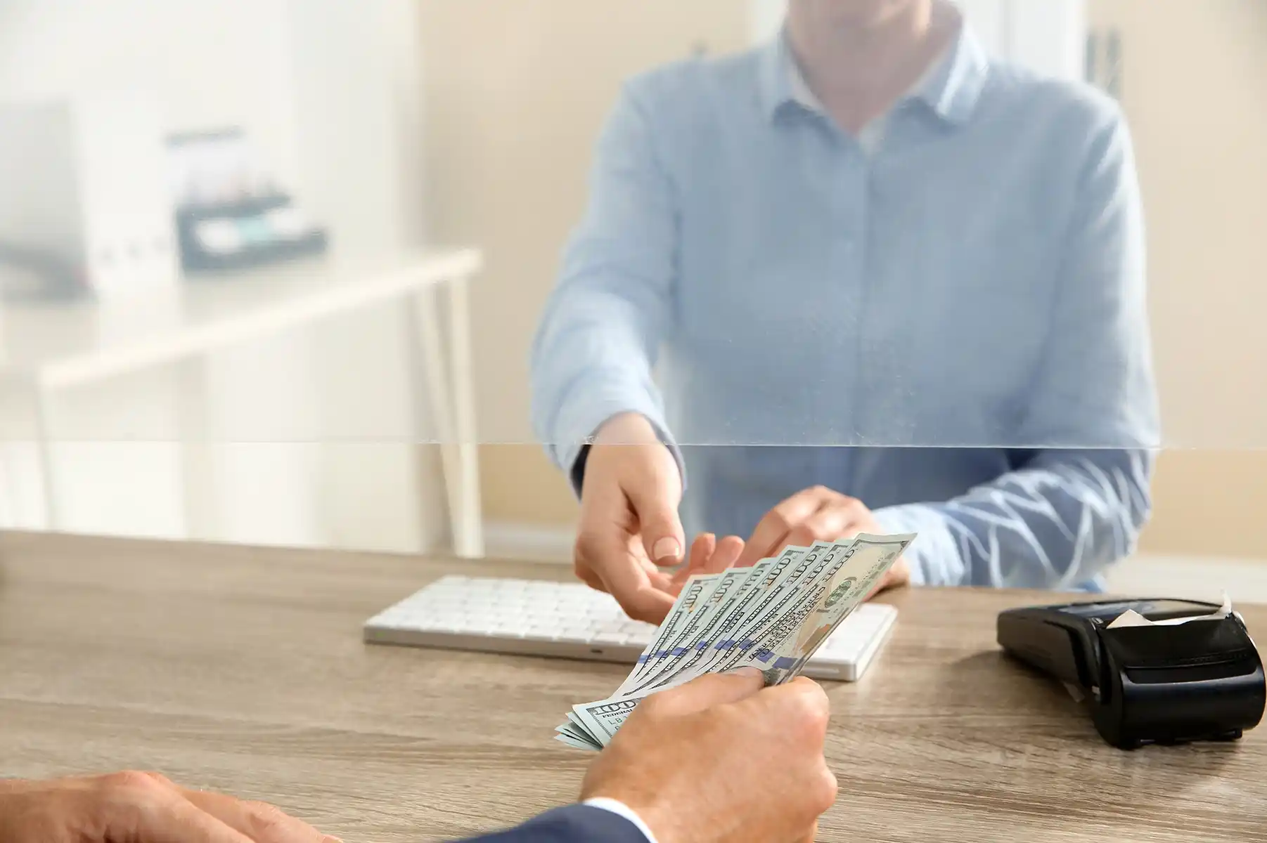 consumer making a cash transaction