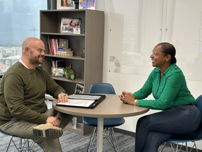 Chris Hughes and Christi Bosuro talking Chris Hughes and Christi Bosuro talking