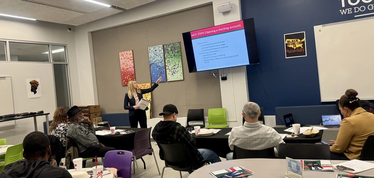 Populus employee teaching financial literacy class