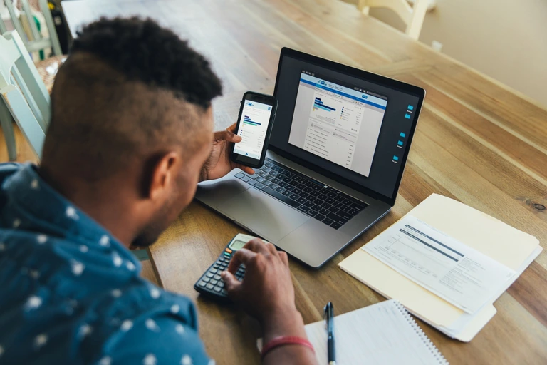 man creating a budget