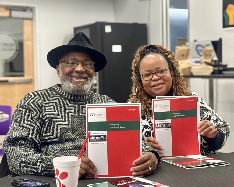 MenzFit financial literacy class attendees smiling