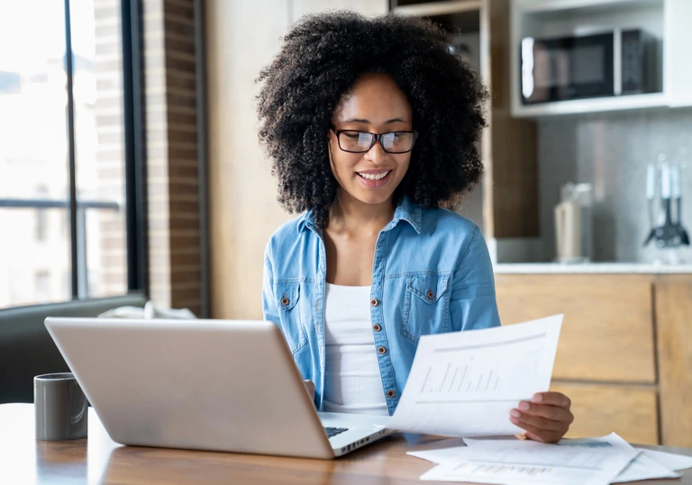 self-employed woman doing taxes