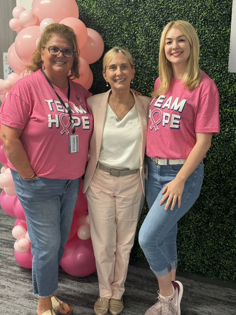 The Populus Financial Group corporate office celebrates Pink Month. Members of Team Hope are Pam E., Jana A., and Lauren W.